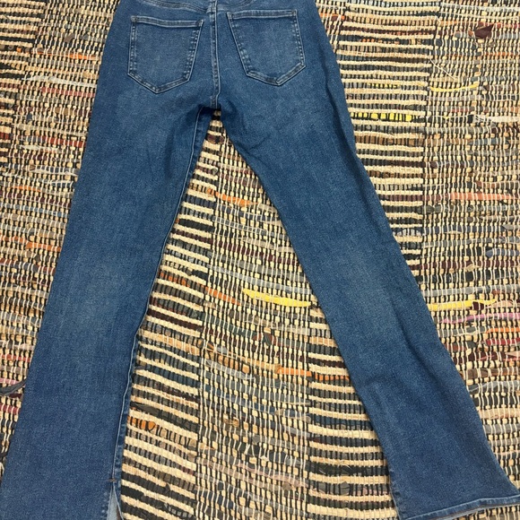 Dark wash small flared jeans with tiny slits on the bottom||Express - Picture 3 of 4
